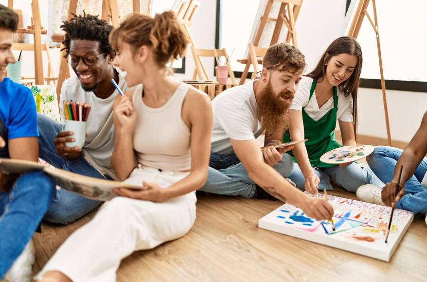 Group painting together to show how personality affects hobbies and the activities people enjoy.